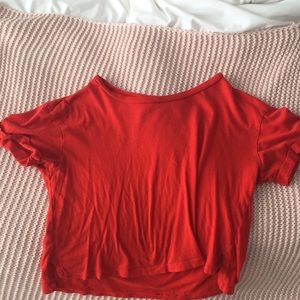 This is a plane red tee
